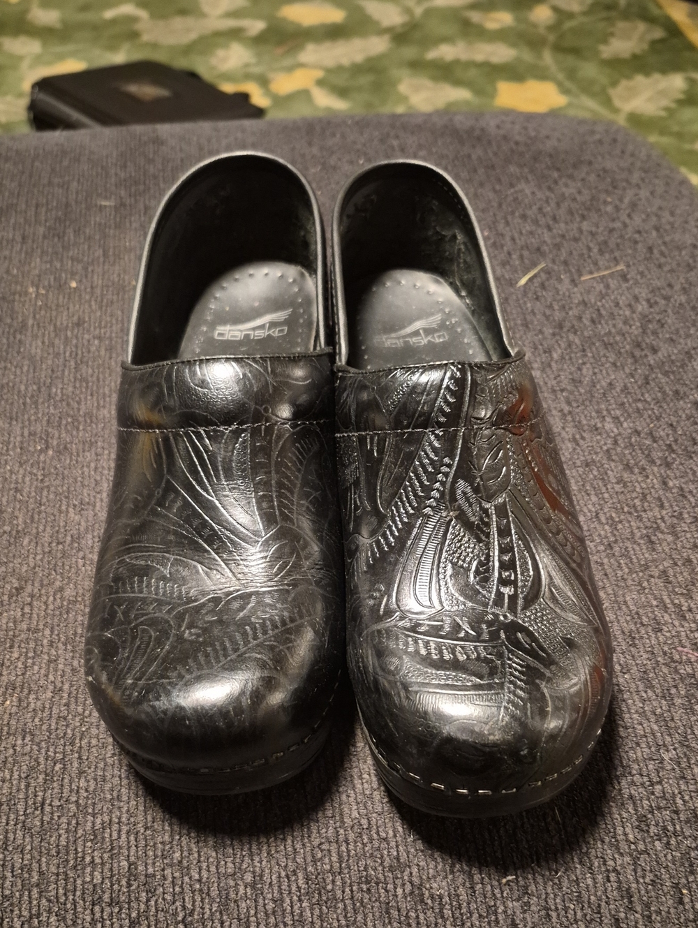 Dansko Black Embossed Leather Slip-On Clogs